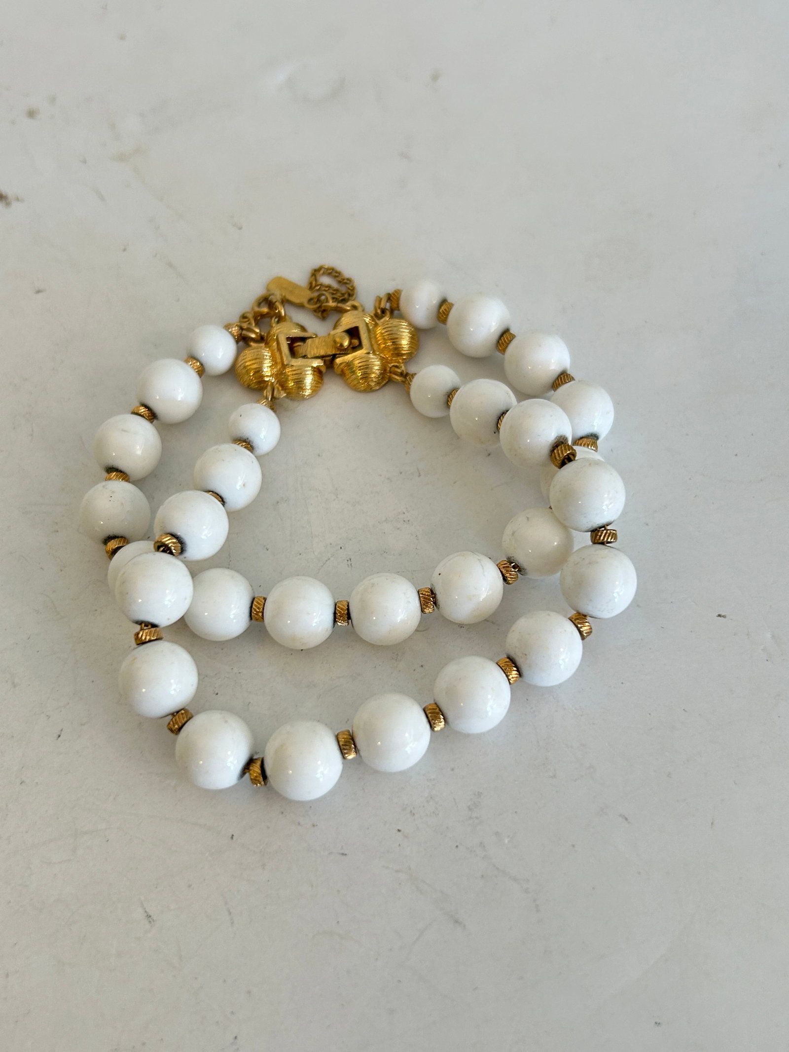 Monet Double Strand White Bead Gold Tone Vintage Bracelet Security Chain 7": Monet Double Strand White Bead Gold Tone Vintage Bracelet Security Chain 7" Please view all photos as they are part of the description and condition of this Item, Feel free to contact me with question