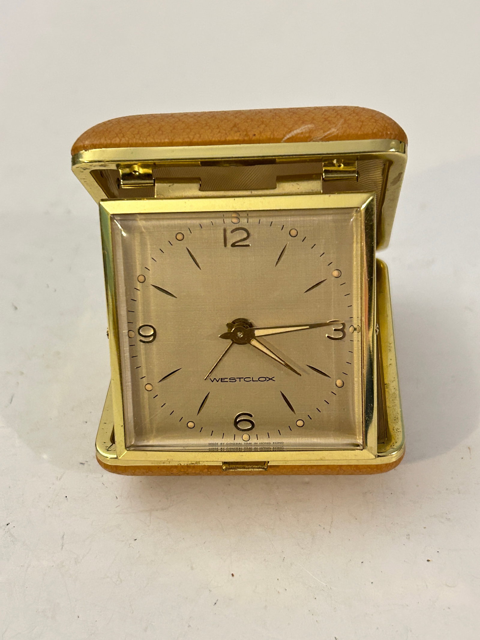 Vintage Westclox Folding Wind Up Travel Alarm Clock-Leather Case Hong Kong working: Vintage Westclox Folding Wind Up Travel Alarm Clock-Leather Case Hong Kong working Please view all photos as they are part of the description and condition of this Item, Feel free to contact me with q