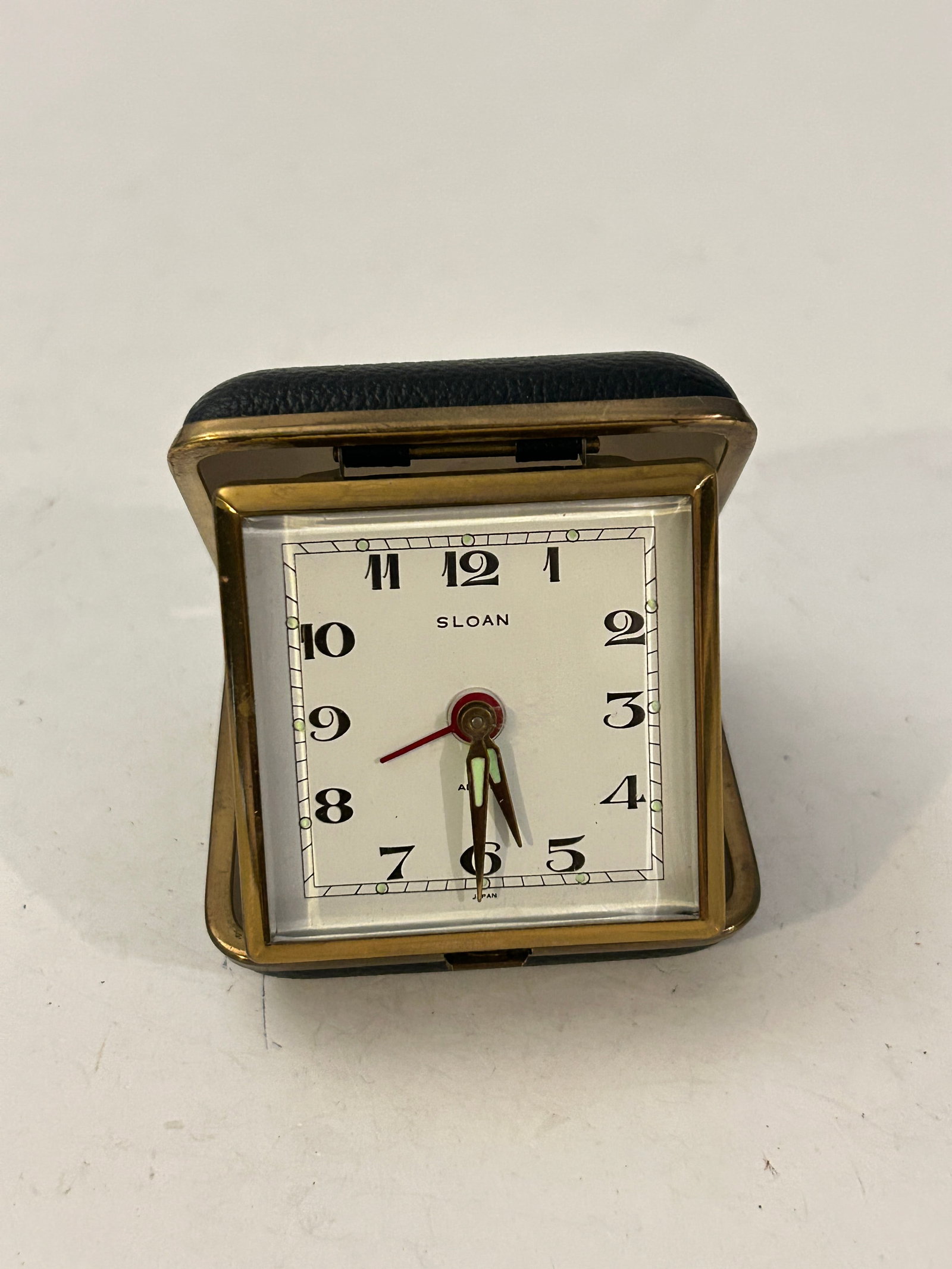 Vintage Sloan Travel Alarm Clock. Made In Japan working: Vintage Sloan Travel Alarm Clock. Made In Japan working Please view all photos as they are part of the description and condition of this Item, Feel free to contact me with questions or picture request