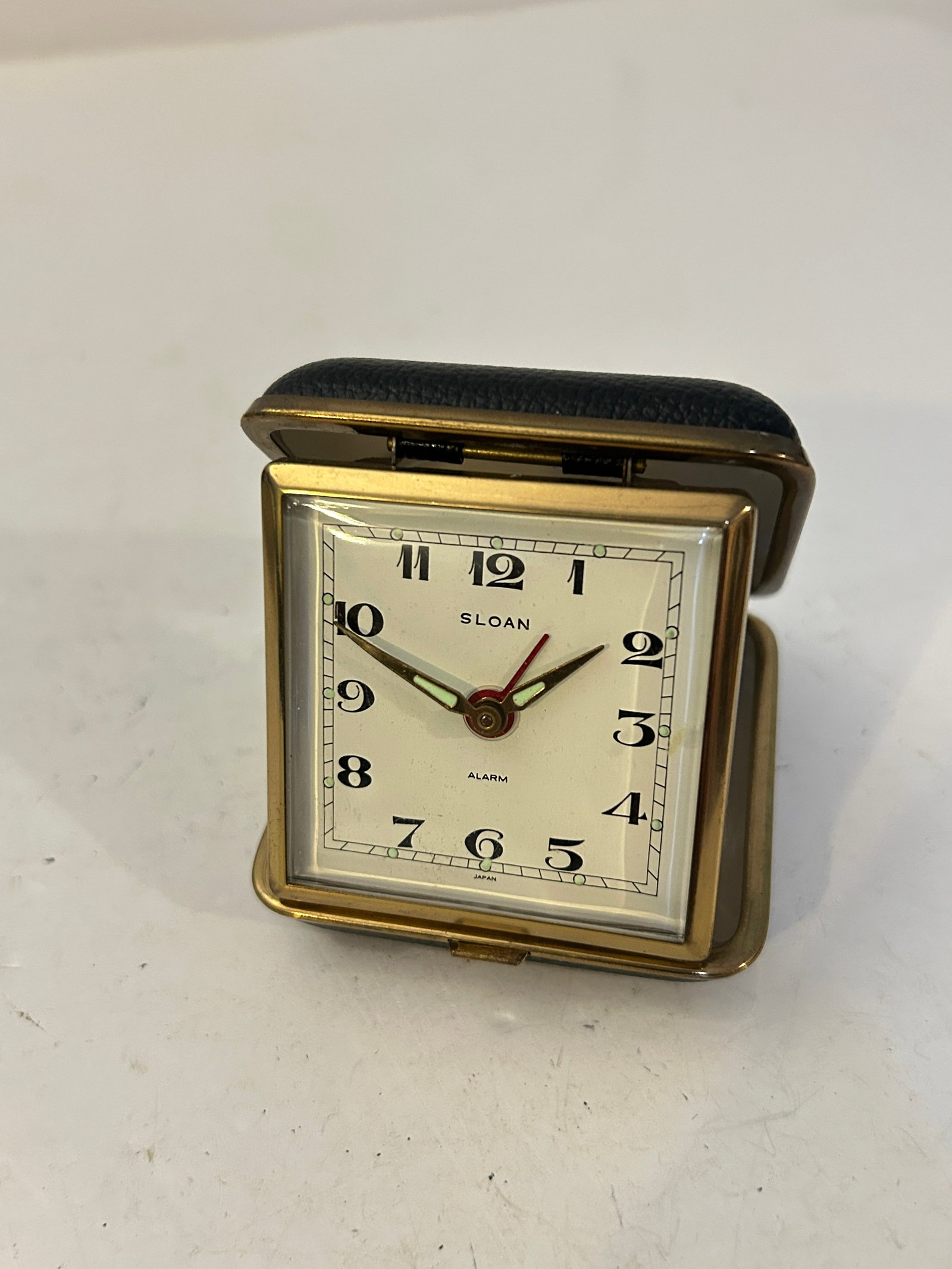 Sloan mechanical travel alarm clock working: Sloan mechanical travel alarm clock working Please view all photos as they are part of the description and condition of this Item, Feel free to contact me with questions or picture requests! Used Item