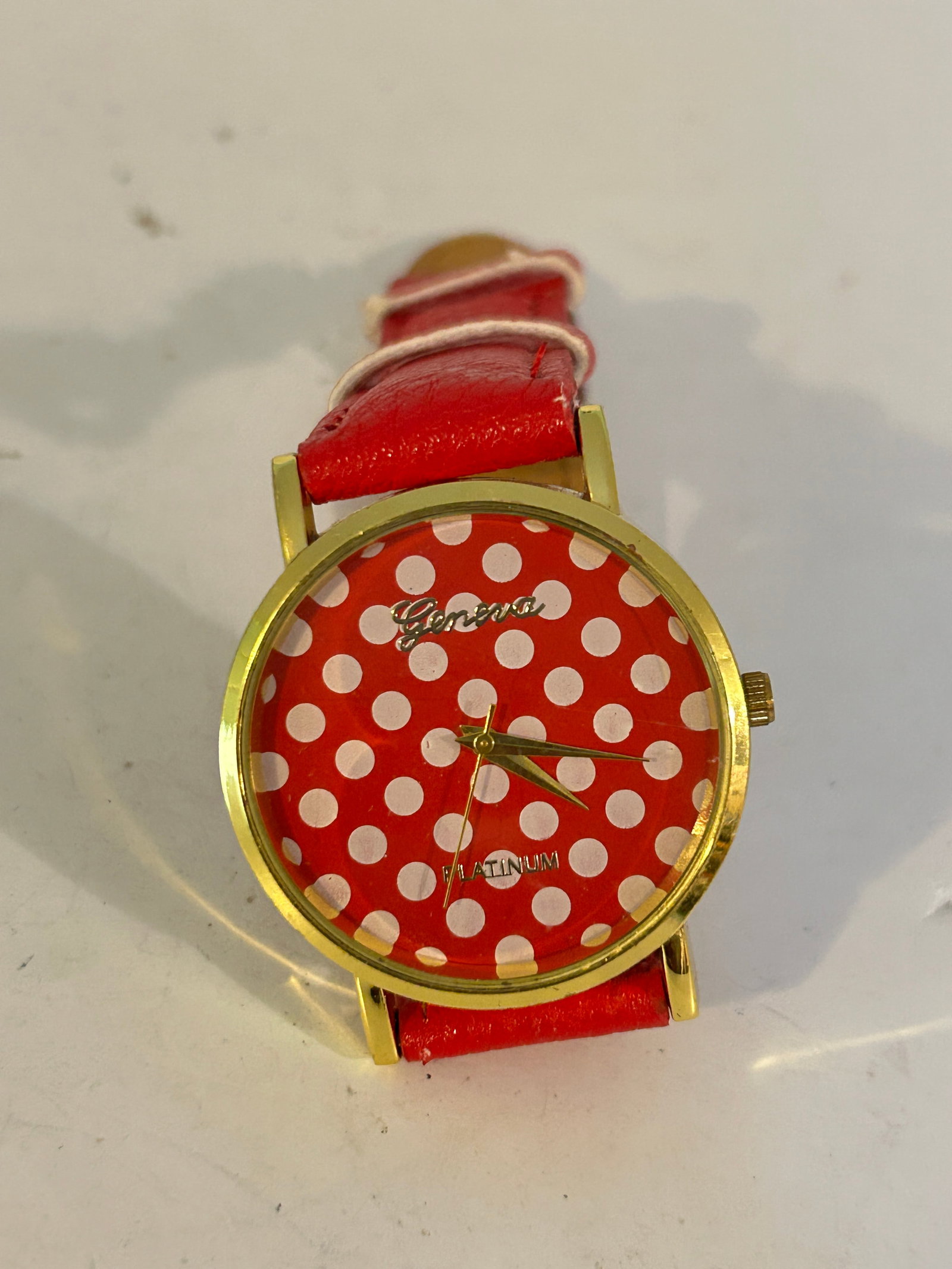Old Quartz Geneva red platinum Watch needs bat: Old Quartz Geneva red platinum Watch needs bat Please view all photos as they are part of the description and condition of this Item, Feel free to contact me with questions or picture requests! Used I