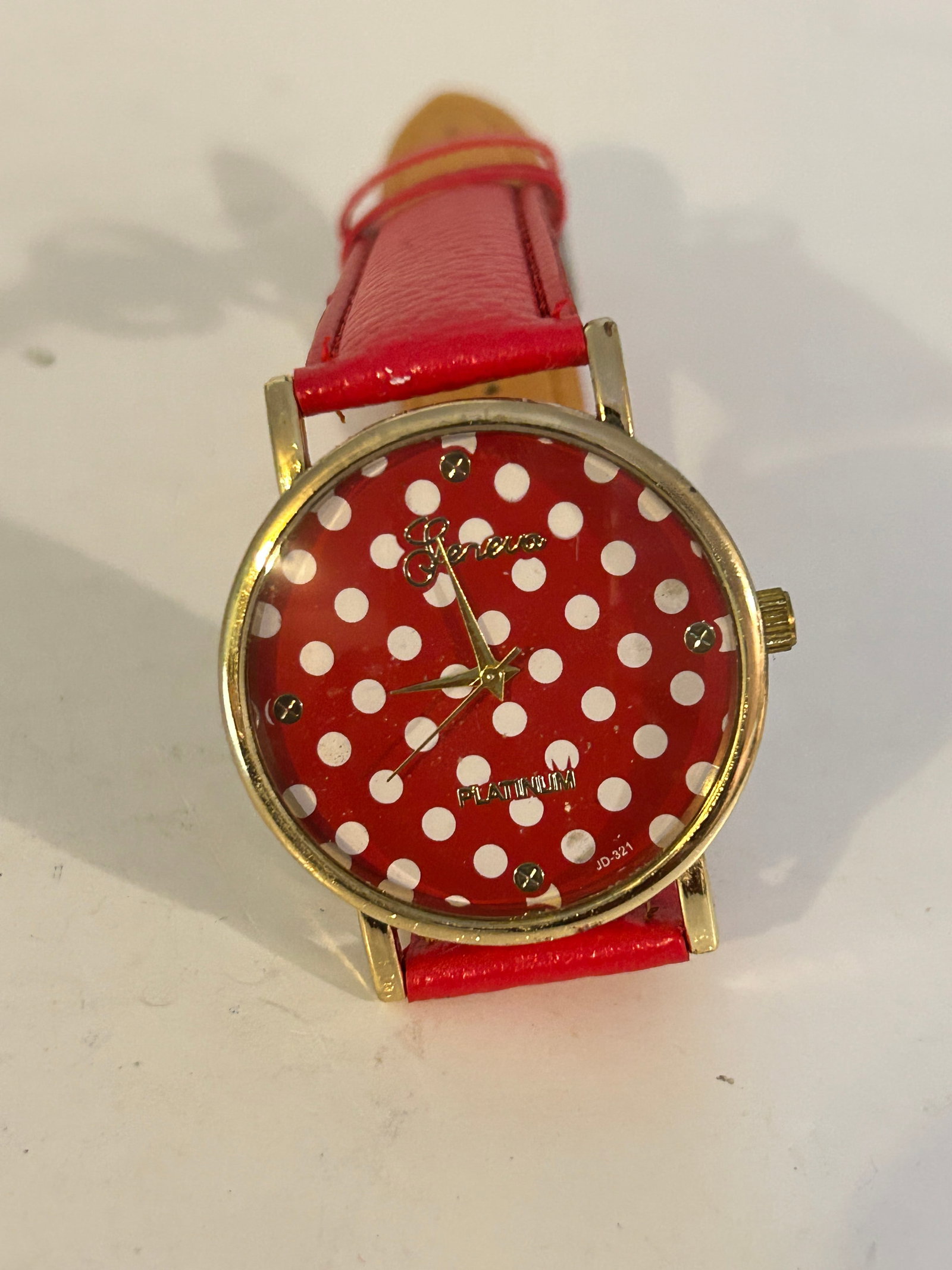 Old Quartz Geneva red platinum Watch needs bat: Old Quartz Geneva red platinum Watch needs bat Please view all photos as they are part of the description and condition of this Item, Feel free to contact me with questions or picture requests! Used I