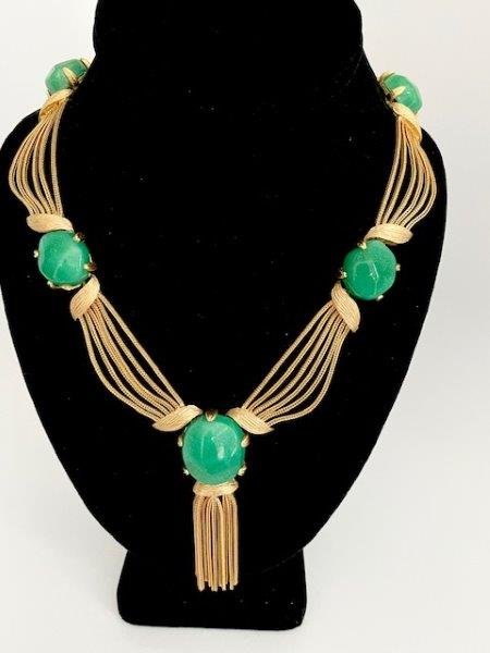VINTAGE 1960'S PEAKING GLASS TASSEL RUNWAY NECKLACE: A great vintage 70's faux godltone and peaking glass prong set swagged tassel necklace that measures 17" long with a 3 1/2" drop.