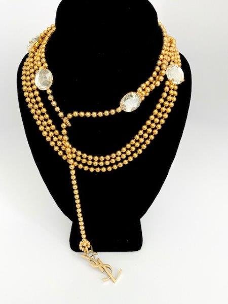 VINTAGE YSL YVES ST LAURENT RUNWAY CHAINMAIL NECKLACE: A special chainmail and headlight crystal necklace signed with the YSL oversized log. the piece measures 38" and can be worn as a necklace or a belt.