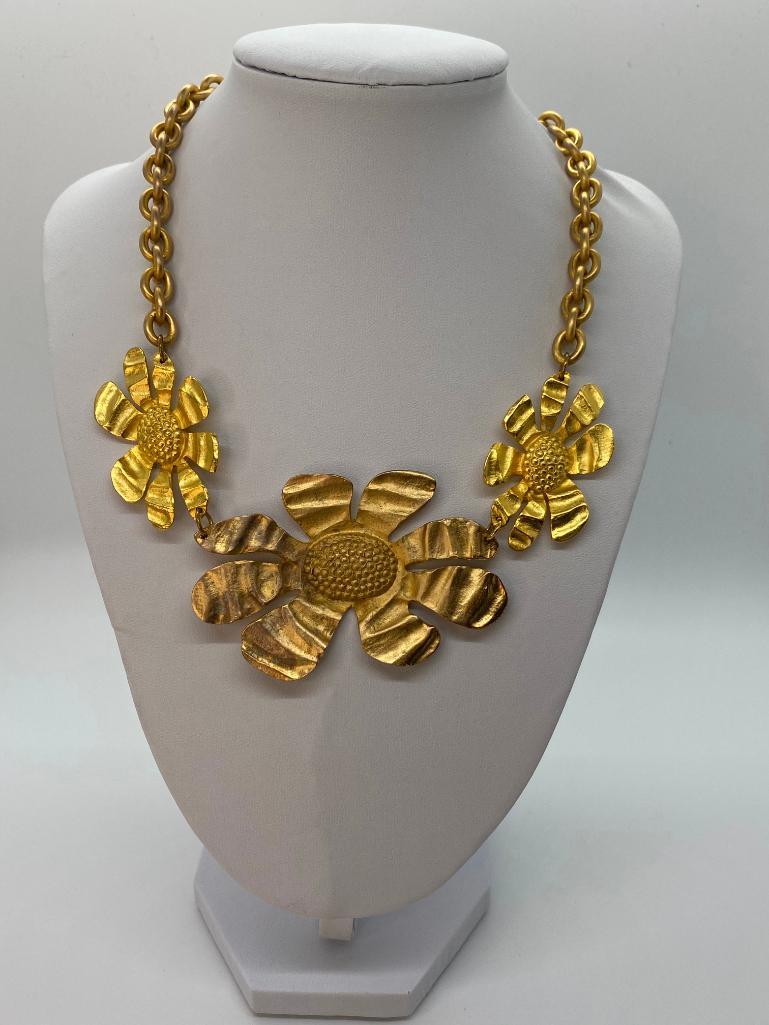 VINTAGE 80'S P&M PARIS OVERSIZED FLOWER NECKLACE: Designer signed gold-tone floral link necklace with lobster claw clasp. P&M Paris. 17" We encourage you to look at Lot #58 for the matching signed bracelet and lot #111 for the matching signed earring