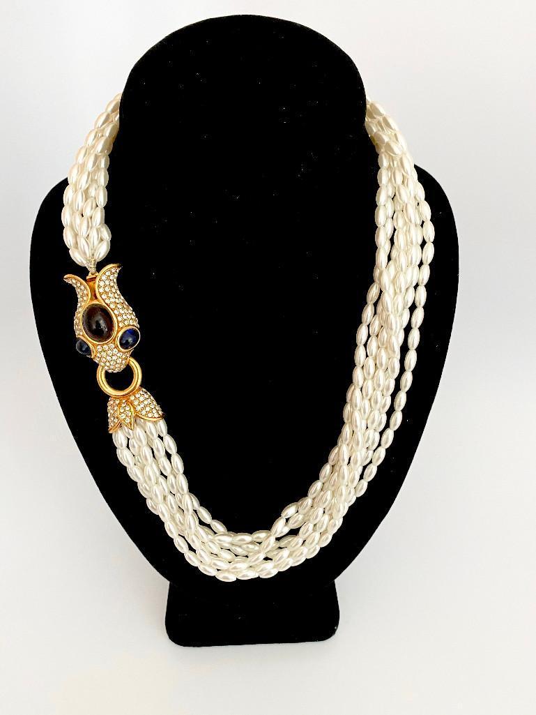 VINTAGE SIGNED CINER 8 STRAND FAUX PEARL SNAKE NECKLACE: An amazing signed Ciner jeweled mogul snakehead necklace strung on 8 strands of faux pearls. The necklace measures 20"