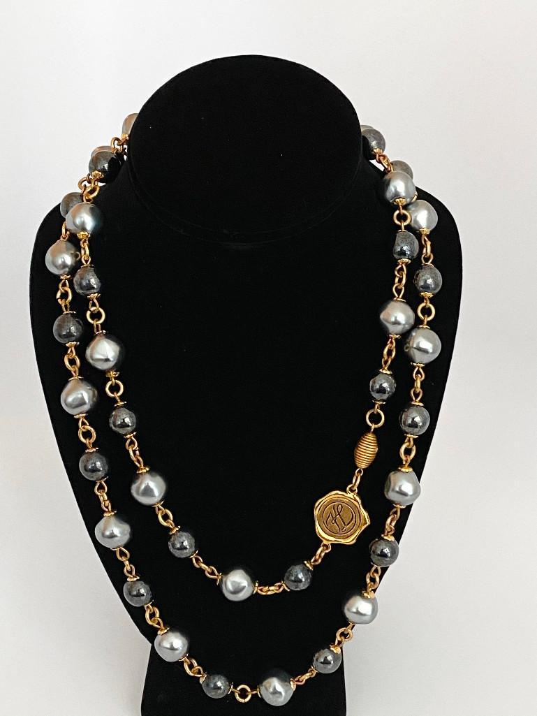 SHADES OF GREY VINTAGE KARL LAGERFELD PEARL NECKLACE: an excellent 44" signed Karl Lagerfeld runway faux pearl and hematite glass necklace with screw barrel clasp.