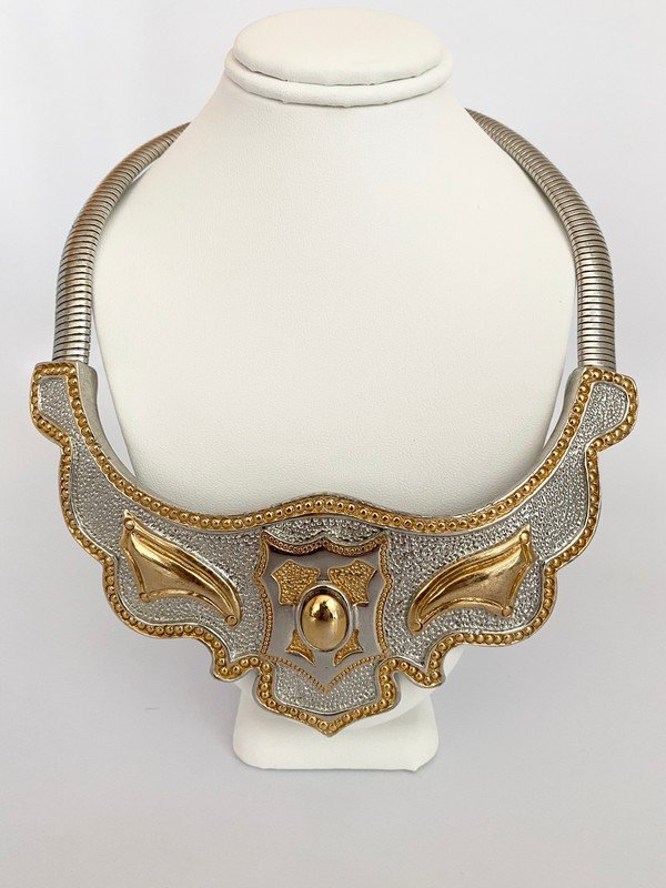 OVERSIZED VINTAGE ALEXIS KIRK NEVER WORN RUNWAY CHOKER: A massive never worn signed Alexis Kirk runway necklace that will fit up to a 20" neck with a massive two tone shield medallion that is 6" wide and 3" long.