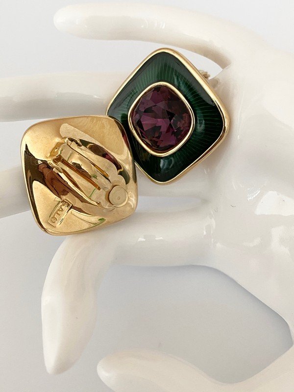 VINTAGE SIGNED SAL 80'S EMEALD ENAMEL AMETHYST EARRINGS: A vintage early paid of signed SAL never worn thick emerald enamel and amethyst crystal clip on earrings. Each measures over 1"