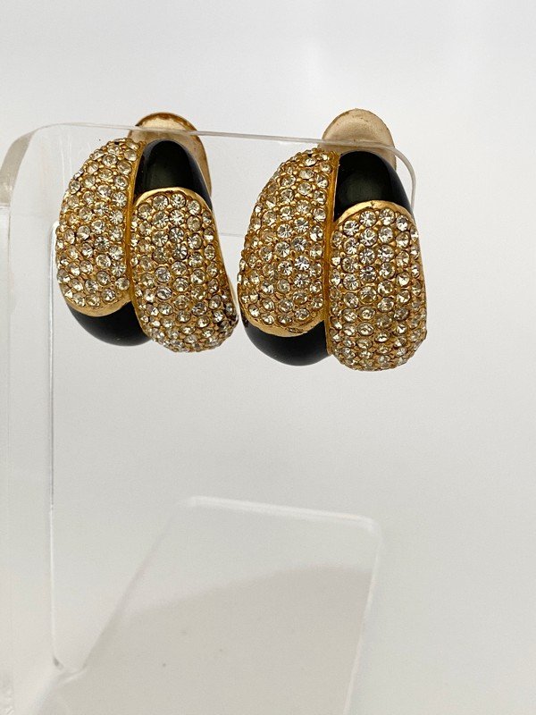 MASSIVE SIGNED VINTAGE CINER WEBB STYLE ENAMEL EARRINGS: A massive signed pair of Ciner ear clips with blinding stones and strong black enameling. Each measures almost 2" rounded and over 1 1/4" wide