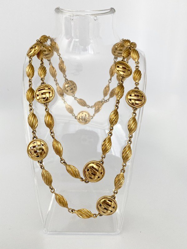 VINTAGE 80'S RUNWAY ST JOHN LOGO HEAVY SAUTOIR NECKLACE: A vintage 44" SJ St. John logo necklace with heavy swirled balls.