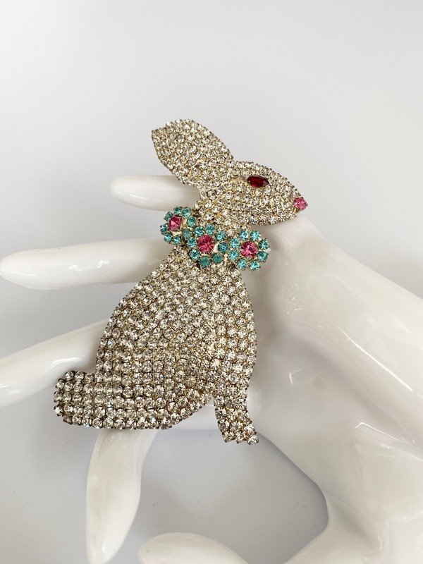 AN ARISTOCRATIC VINTAGE JEWELED CZECH RABBIT BROOCH: An oversized 3 1.2" rabbit brooch covered in hundreds of flawless prong set rhinestones. Czech in origin