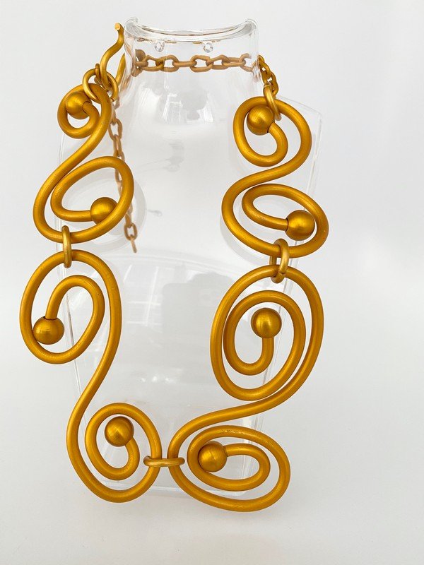 DESIGNER SIGNED JILL FAGIN ALUMINUM RUNWAY NECKLACE: An oversized necklace signed by Jill Fagin. Measures 20" long with each link measuring over 4"
