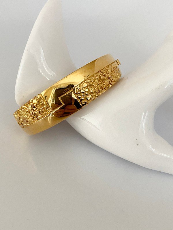 VINTAGE GIVENCHY PARIS DATED 1979 RUNWAY BRACELET: A signed Givenchy Paris 1979 runway bracelet. The piece measures 2 1/2" oval