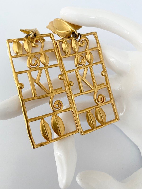 VINTAGE KARL LAGERFELD PARIS LARGE RUNWAY EARRINGS: A pair of vintage 3 1/2" signed KL lagerfeld clip on earrings