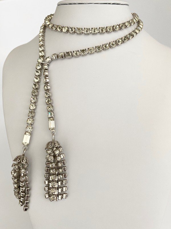 ROGER JEAN PIERRE EXCEPTIONAL VINTAGE FRENCH LARIAT: An exceptional unsigned (as all pieces are) prong set lariat necklace. The piece measures 36" not including the 3" tassels. The crystals are glass and prong set; the attached hook allows you to wear t