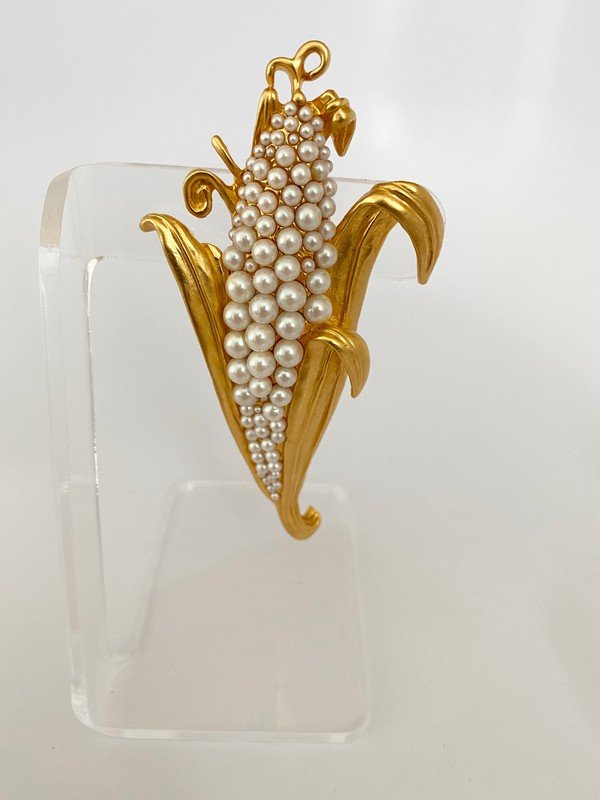 VINTAGE KARL LAGERFELD PARIS VEGETABLE RUNWAY BROOCH: A 4" long never worn signed brooch by Karl Lagerfeld paris from his vegetable series.