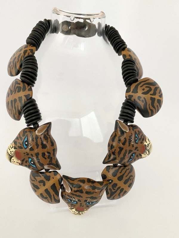 GERDA LYNGGAARD FOR MONIES RARE EXOTIC CAT NECKLACE: An amazing signed Gerda Lynggaard for Monies wood and horn disc necklace with exotic cats. The piece measures 20" and each cat is handpainted wood and measures 2 1/2". Check our next lot for the match