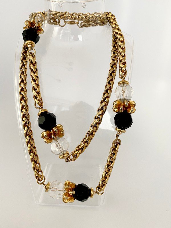 VINTAGE ONYX & CRYSTAL FACET CUT FRENCH 80'S SAUTOIR: A 34" vintage clasped sautoir with heavy gold plated sattions with facet cut onyx and clear crystal heavy beads