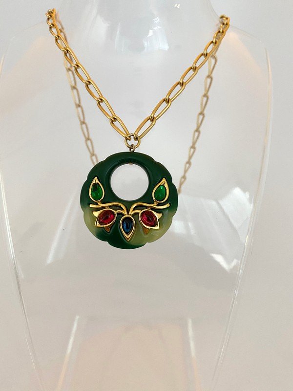 VINTAGE TRIFARI FAUX JADE JEWELED MOGUL NECKLACE: A signed trifari carved resin jade pendant with bezel set glass cabochons on an 18" chain