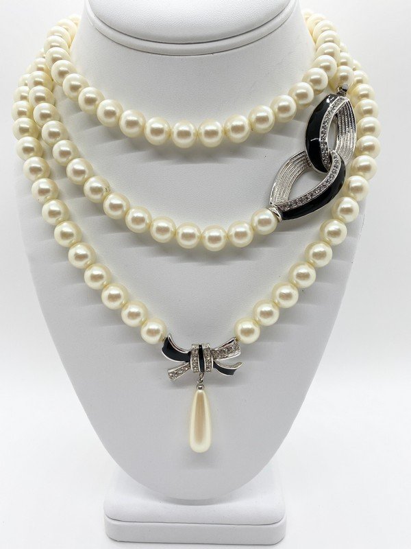 VINTAGE LOT OF 80S FAUX PEARL NECKLACE BY GIVENCHY & RICHELIEU: A signed givenchy paris 20" faux pearl necklace with enamel and crystal bow drop and a wonderful faux deco clasped faux pearl necklace by Richelieu