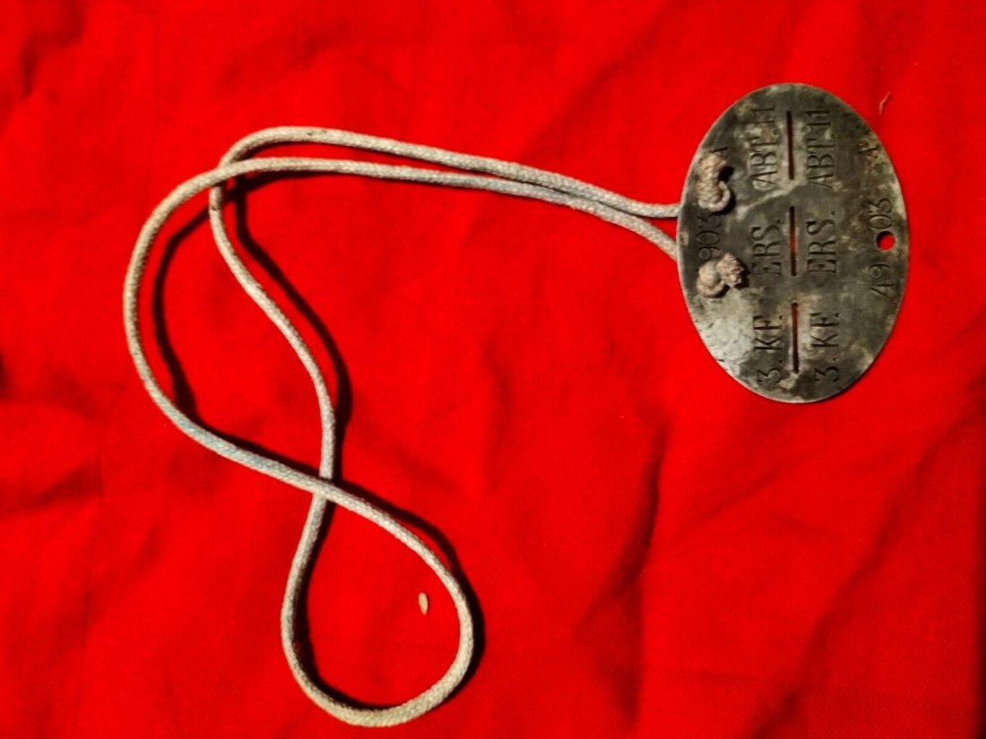 WWII German Dog Tag: A beautiful German World War II dog tag in T.B.E. printed 3 KF. ERS. ABT. 11 with number 4903 and blood type A (see detail)