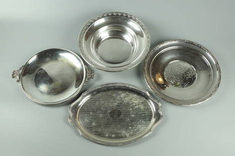 Four Sterling Silver Dishes: Four sterling silver dishes, total weight 1038.9 grams (33.4 ounces)