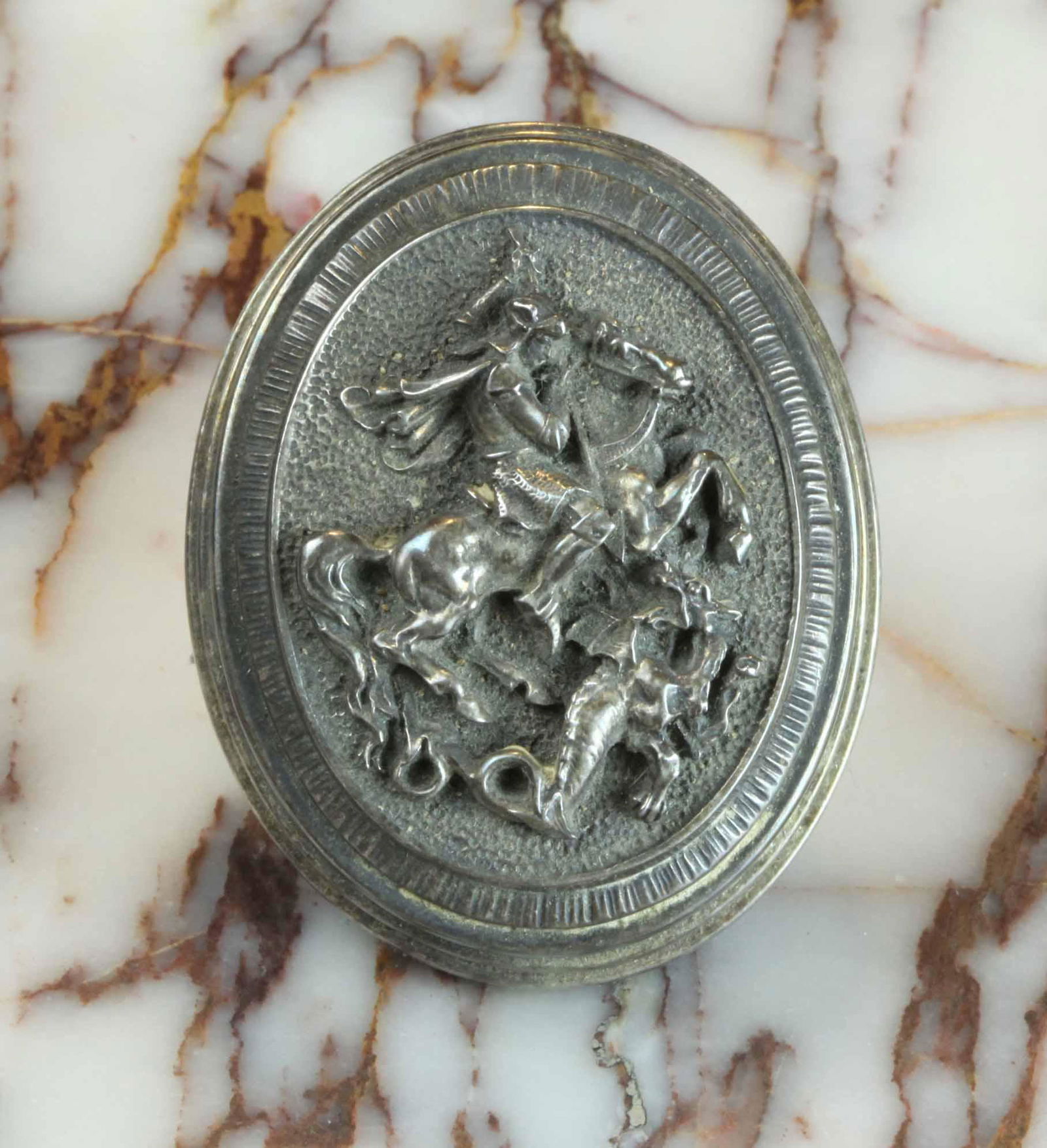 A collectible sterling silver paperweight, marked (1 of 4)