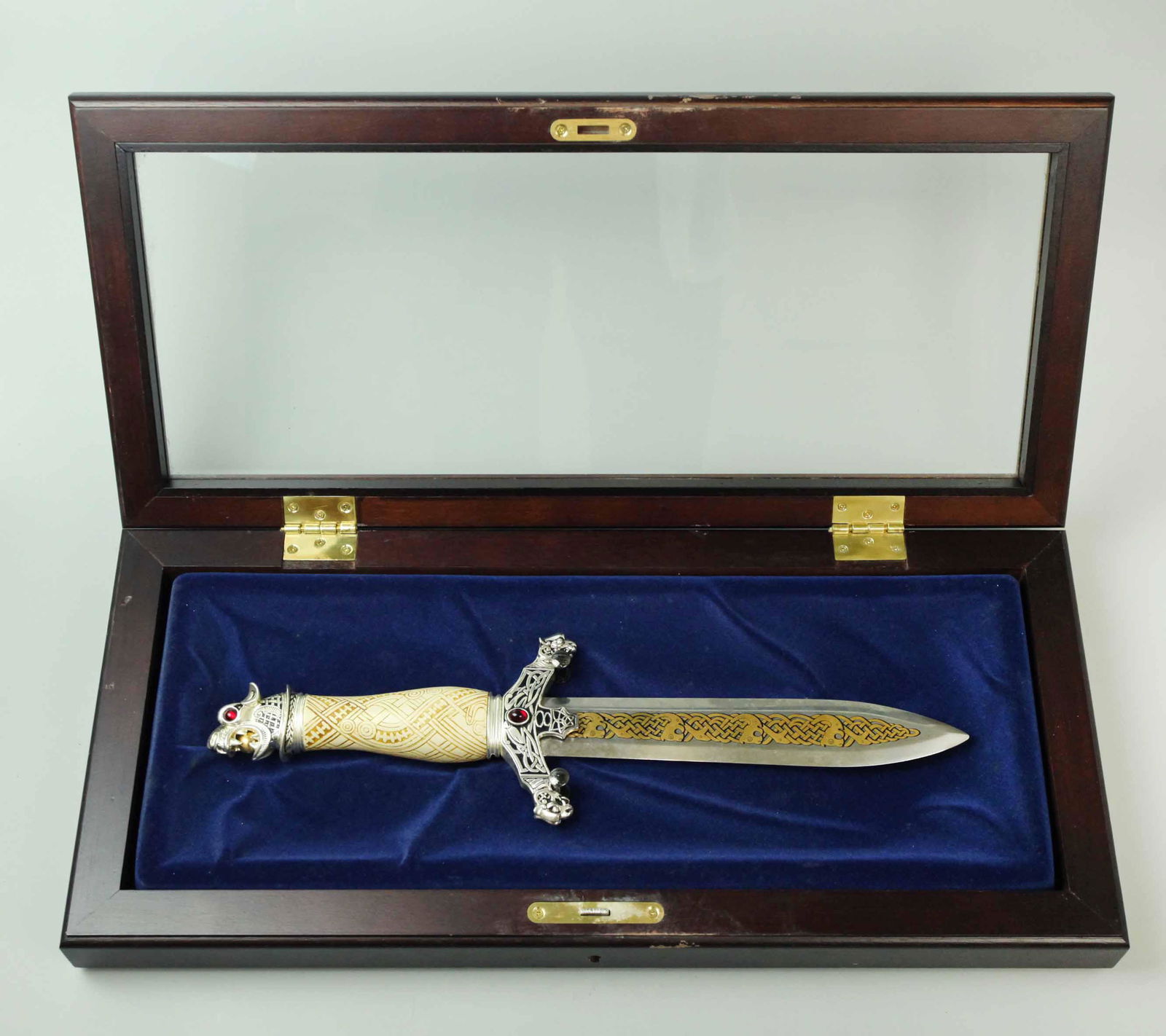 1988 Franklin mint "The Viking knife": 1988 Franklin Mint limited edition fantasy collector knife originally marketed as "The Viking Knife", in original case. Stylized dragon head pommel with ruby-colored eyes, faux scrimshaw grip, and qui