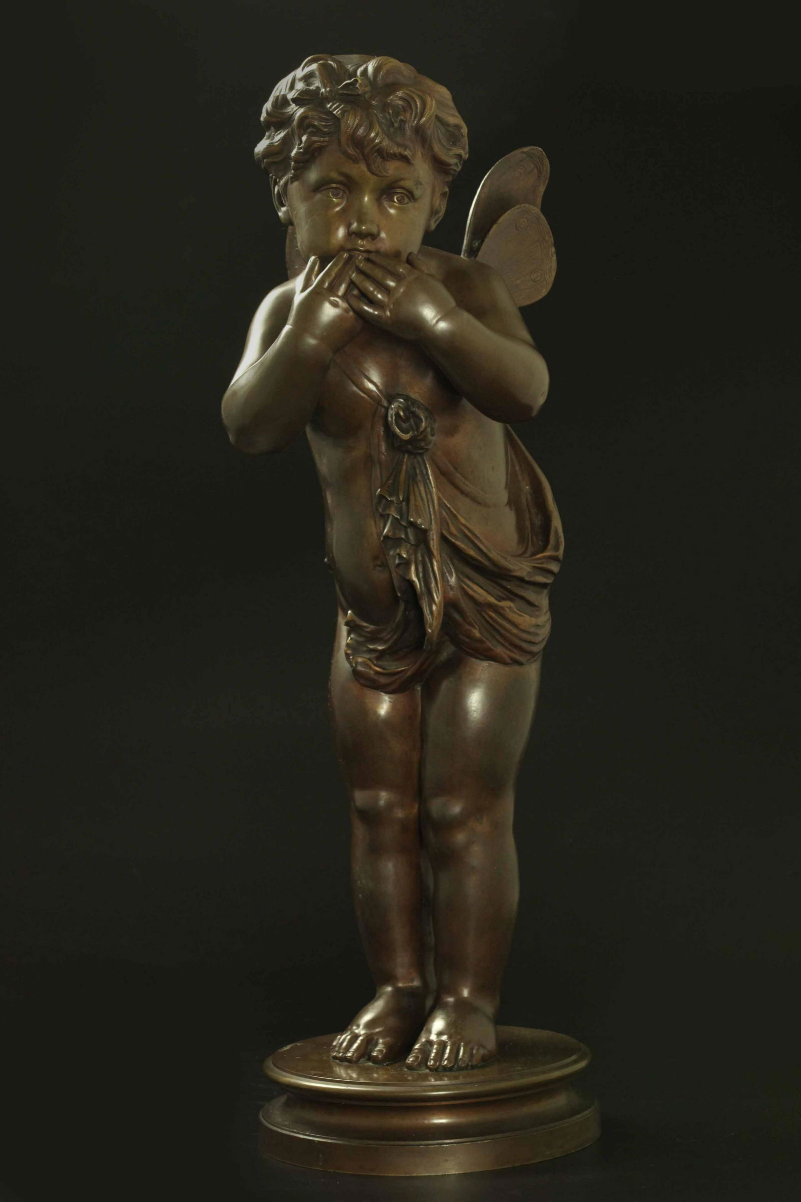 Large 19th century bronze statue of a cherub blowing a kiss (1 of 8)