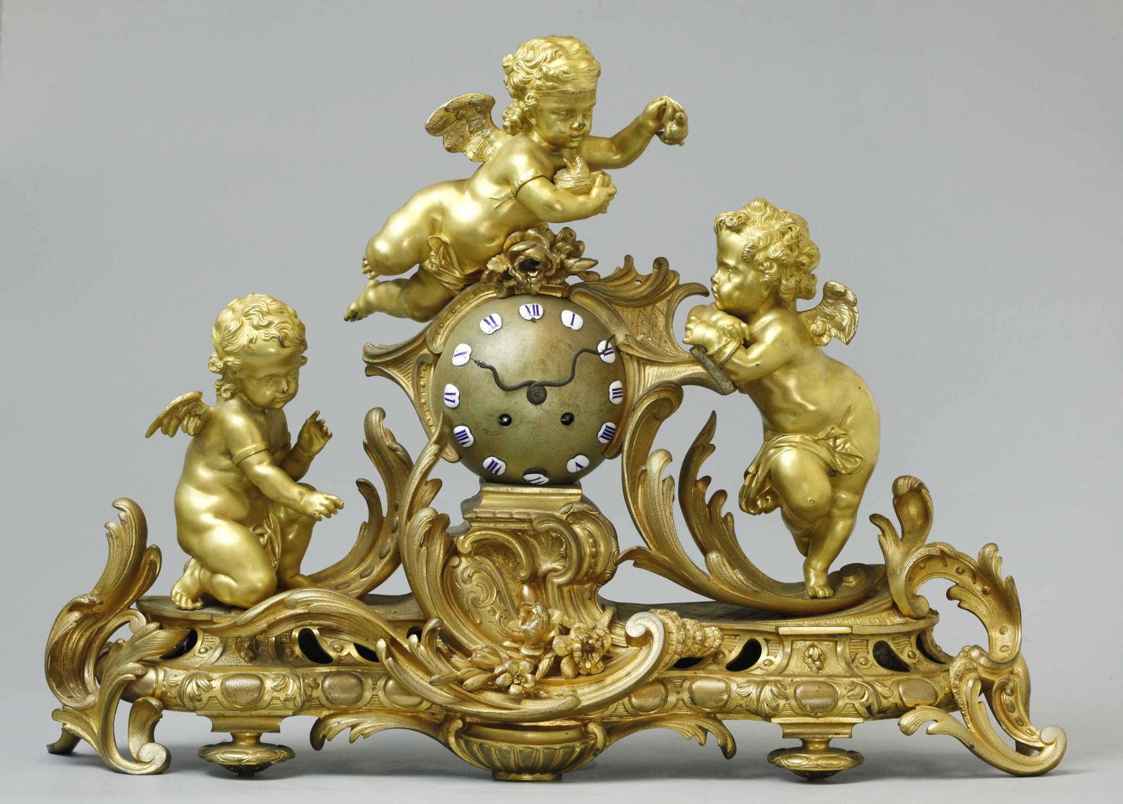 19 C Dore bronze mantel clock with three cherubs (1 of 9)