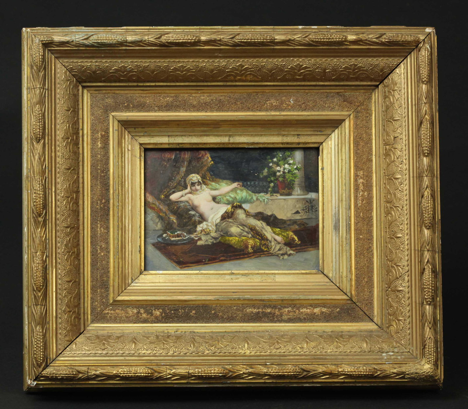 Late 19th century Orientalist miniature water color of a reclining semi nude, signed: Late 19th century, Orientalist miniature water color of a reclining semi nude in probably original giltwood frame. Artist signed in Arabic. 4.5" x 6" without frame, 11.5" x13" with frame