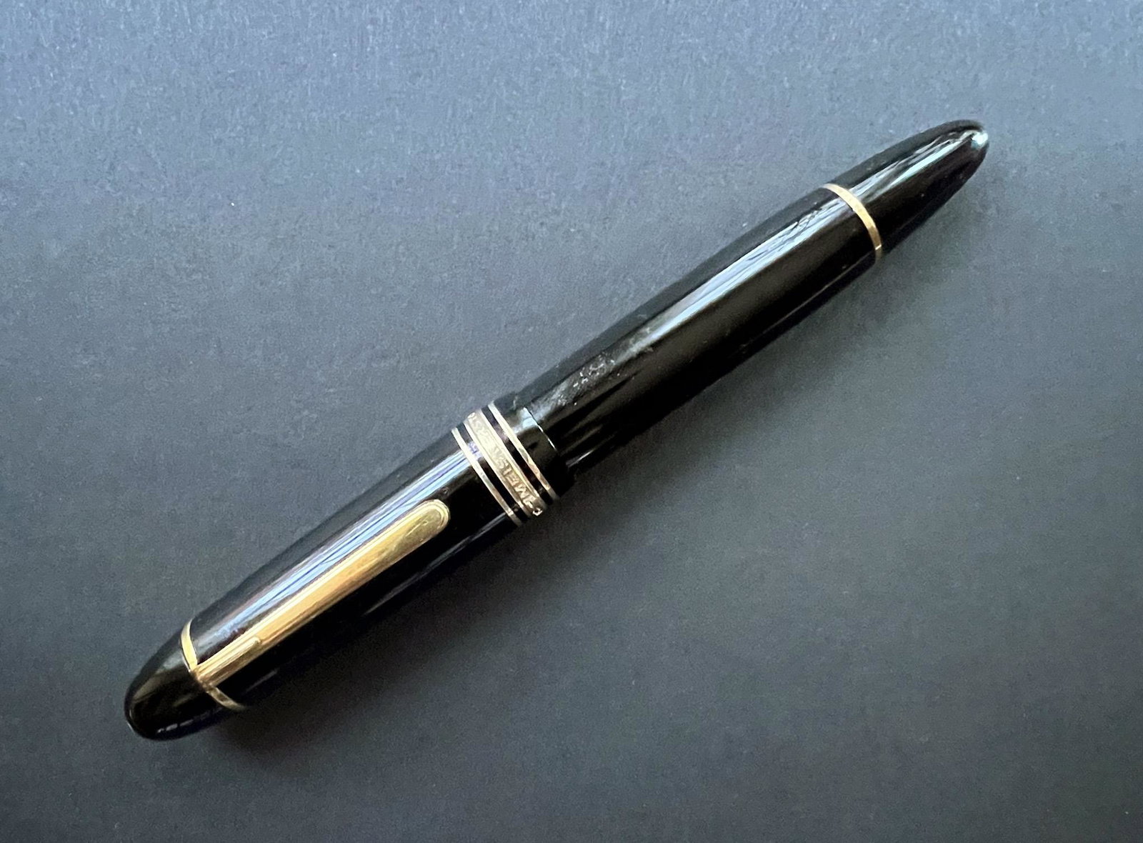 Montblanc Meisterstuck Diplomat 149 Fountain Pen Black resin fountain pen: Montblanc Meisterstuck Diplomat 149 Fountain Pen Black resin fountain pen, large 149 size, gold-plated clip and trim,white cap top star, band engraved "MONTBLANC - MEISTERSTUCK No. 149 ." Piston-