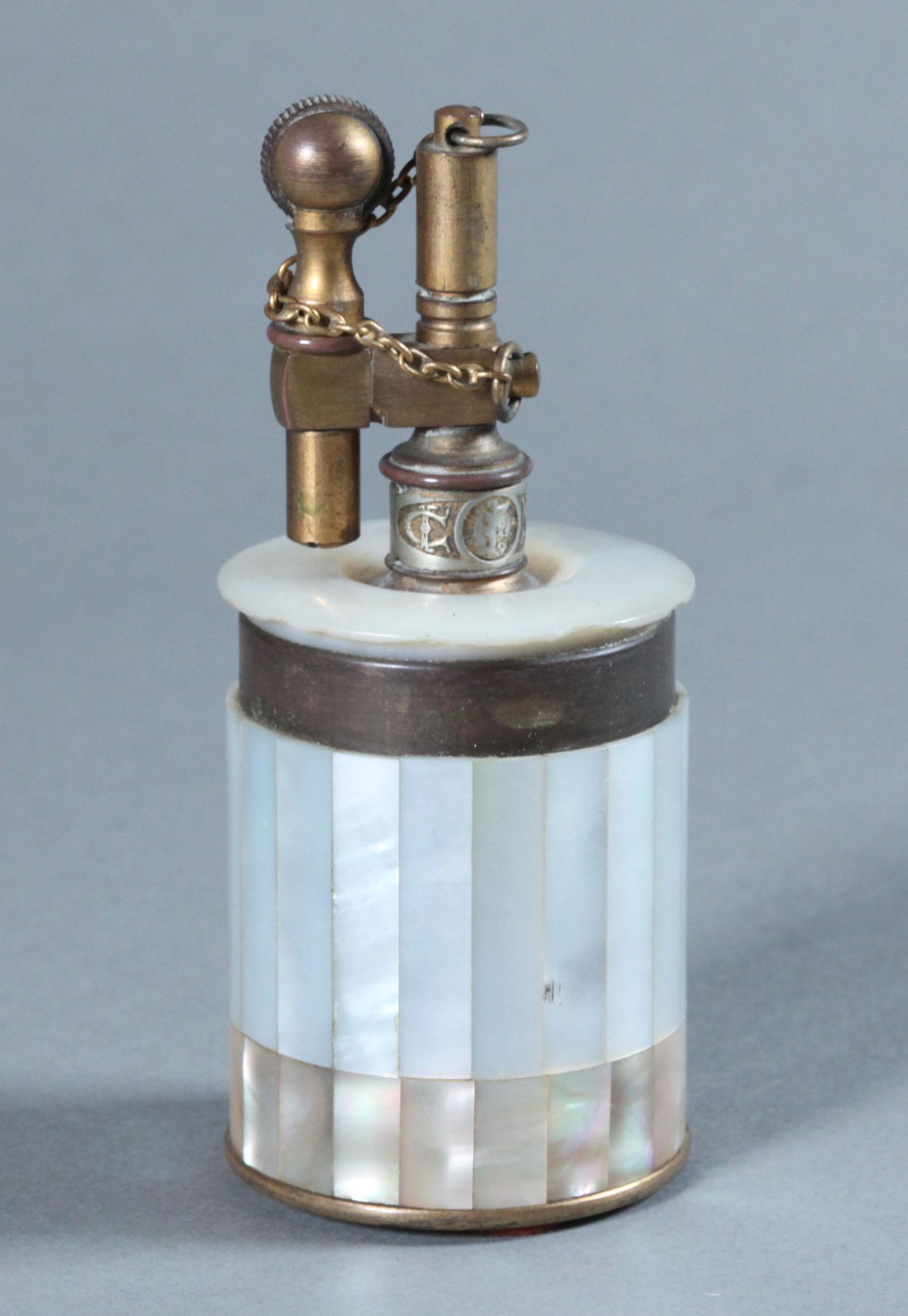 ANTIQUE ART DECO TIFFANY & CO. FRANCE MOTHER OF PEARL LIGHTER: ANTIQUE ART DECO TIFFANY & CO. FRANCE MOTHER OF PEARL LIGHTER. RARE. 3 3/4 tall 1.5" diam.