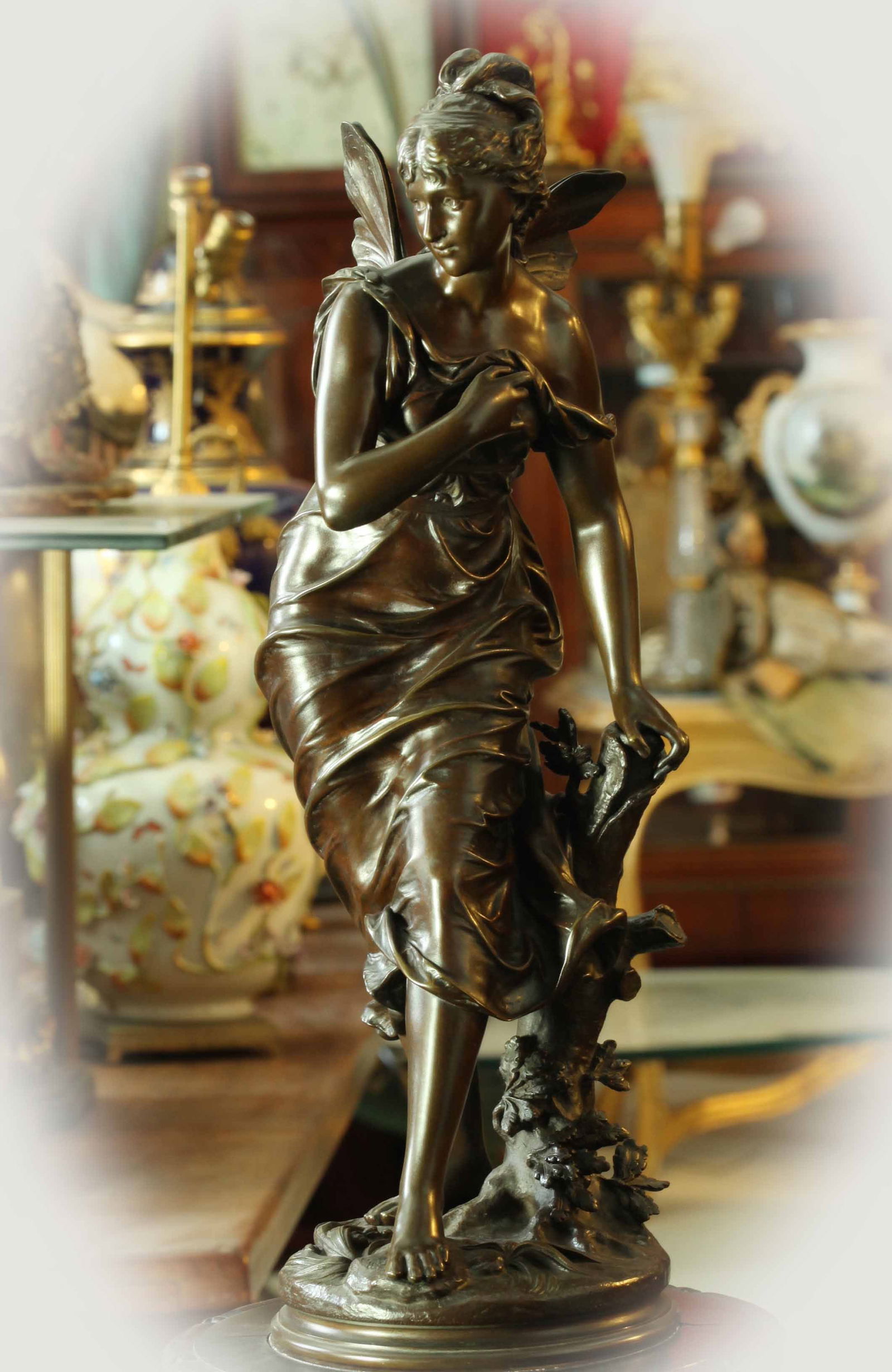 19th century brown patina bronze sculpture of pretty woman with wings holding branch, signed Bouret (1 of 8)