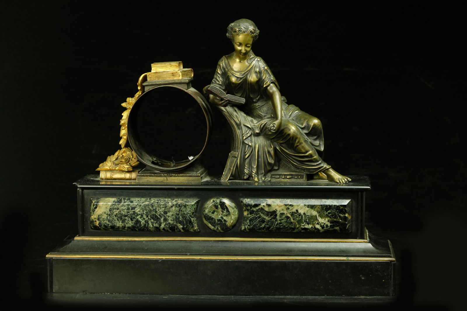 Portion of an antique bronze clock (1 of 3)
