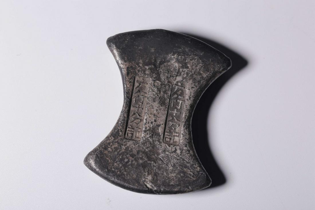 A Chinese Silver Ingot with Guang Hang Shi Fen Ji Mark: L 7cm W 5.3cm Thickness 1.2cm Weight 326g