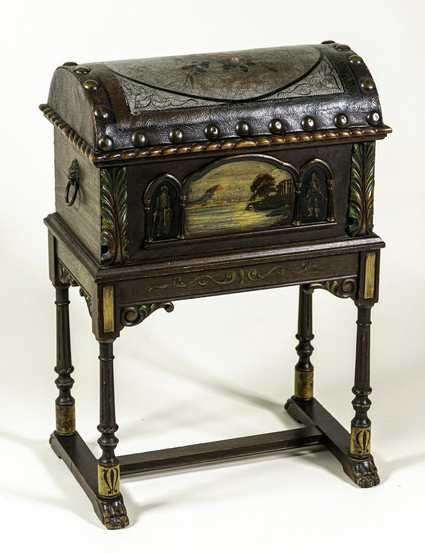 Tudor Revival Smoking or Liquor Cabinet: Circa 1920's with handpainted leather trunk top, landscape scene on front flanked by Elizabethan figures, removable metal humidor insert, with extensive carved and polychromed base, 29.5 x 19.5 x 13.5