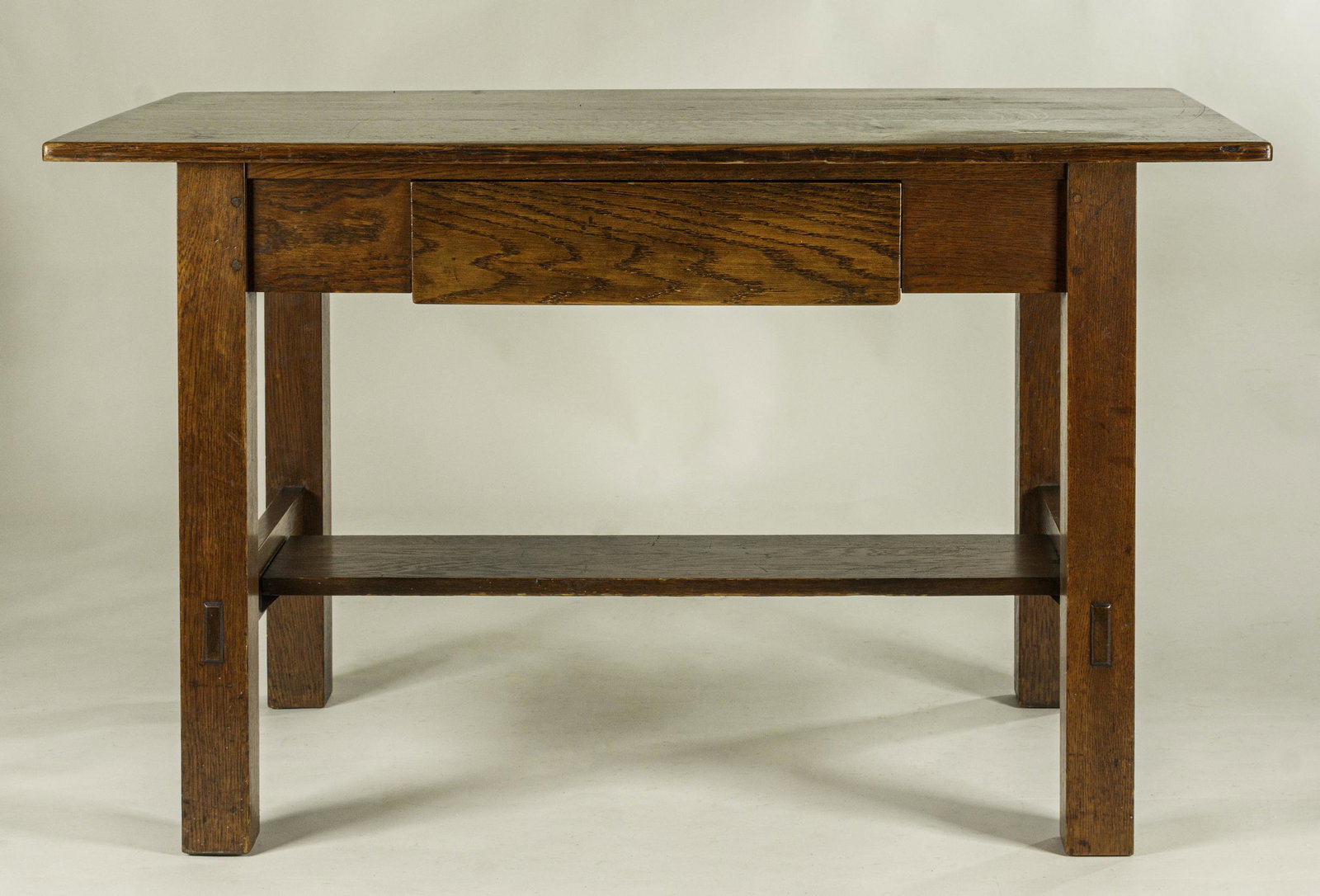 Limbert Arts & Crafts Oak Library Table: Grand Rapids, MI. Quartersawn oak, pegged through tenons, single drawer, branded mark, 29 x 48 x 28"