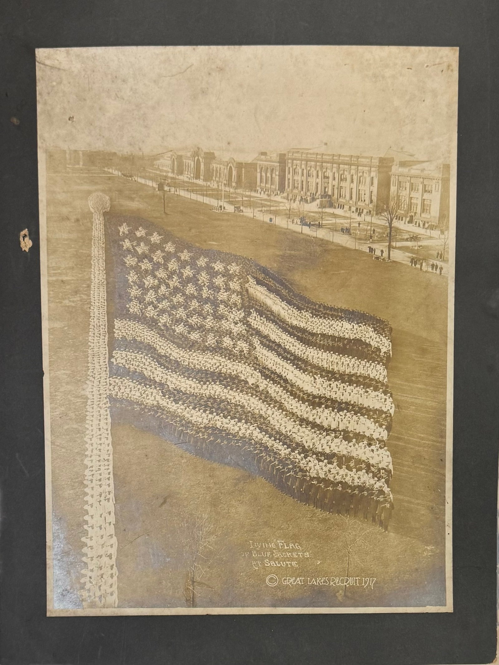 Thomas Mole & John D. Thomas “The Living Flag of Blue, Jackets at Salute.Photograph: Thomas Mole & John D. Thomas. “The Living Flag of Blue, Jackets at Salute.” 1917. Photograph, 14” by 10-1/4”. “In search of some eye-catching imagery to boost morale surrounding 