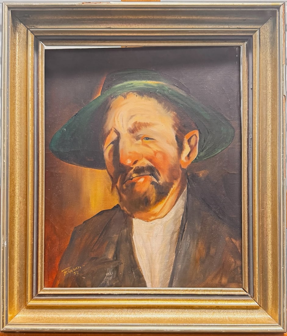 Vintage American Ashcan Style portrait Oil Painting Signed: This expressive vintage oil portrait captures a rugged, weathered man wearing a broad green hat, rendered with bold brushwork and warm, earthy tones. The artist skillfully highlights the subject’s t