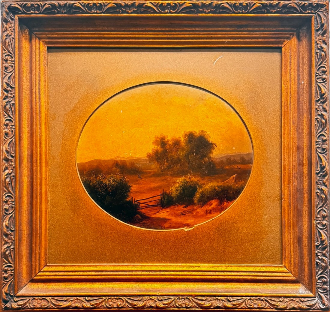 Antique Oval Landscape Oil Painting – Country Road & Trees in Ornate Gilt Frame: This charming antique oil painting features a peaceful countryside scene rendered within an elegant oval opening. A winding dirt road leads the viewer into the soft, misty landscape, bordered by trees