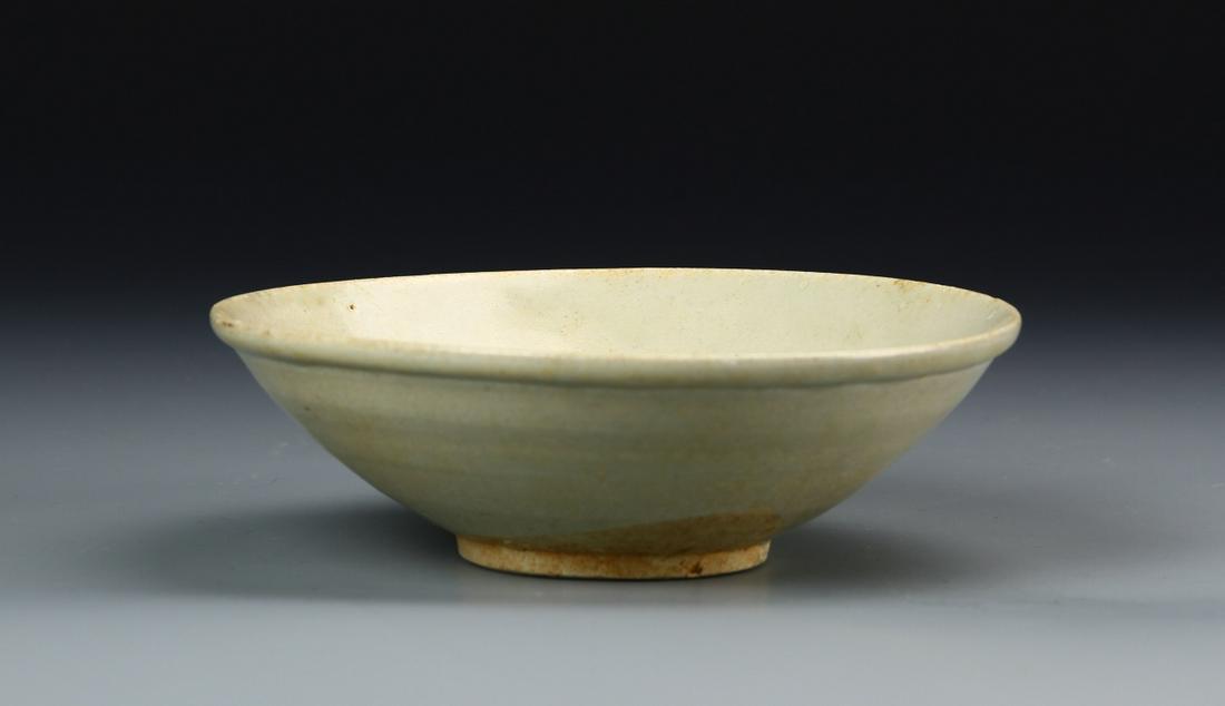 Chinese Yue Yao Bowl: China, antique Yue Yao bowl, deep rimmed body on footed base, deep sea green finish throughout, bordered lines and patina on base. Diameter 6 1/2 in., Height 2 in.