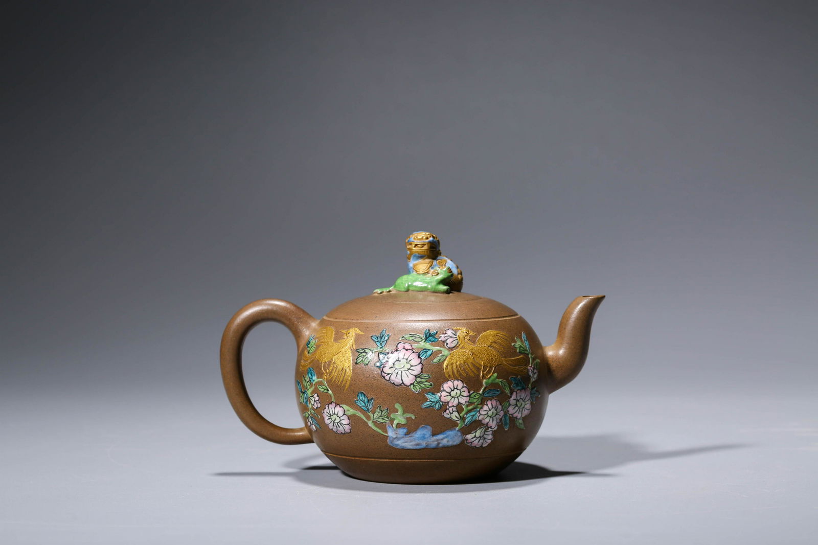 A CHINESE GILT-INLAID REDWARE TEAPOT MARKED KANG XI (1 of 11)
