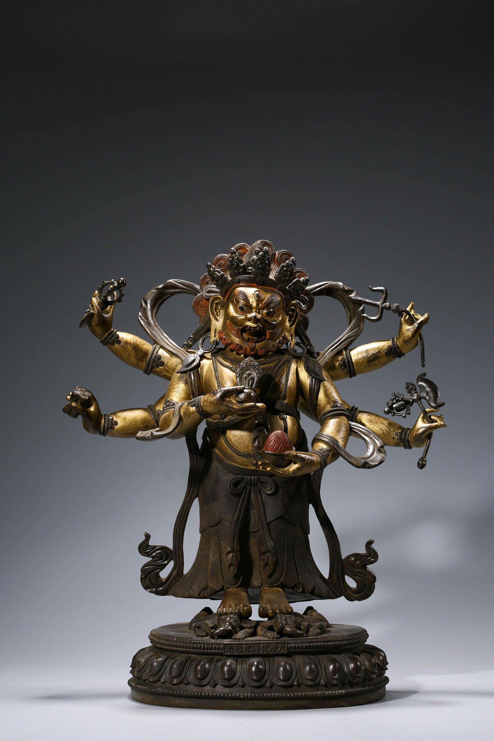 A CHINESE GILT-BRONZE MAHAKALA STATUE (1 of 13)