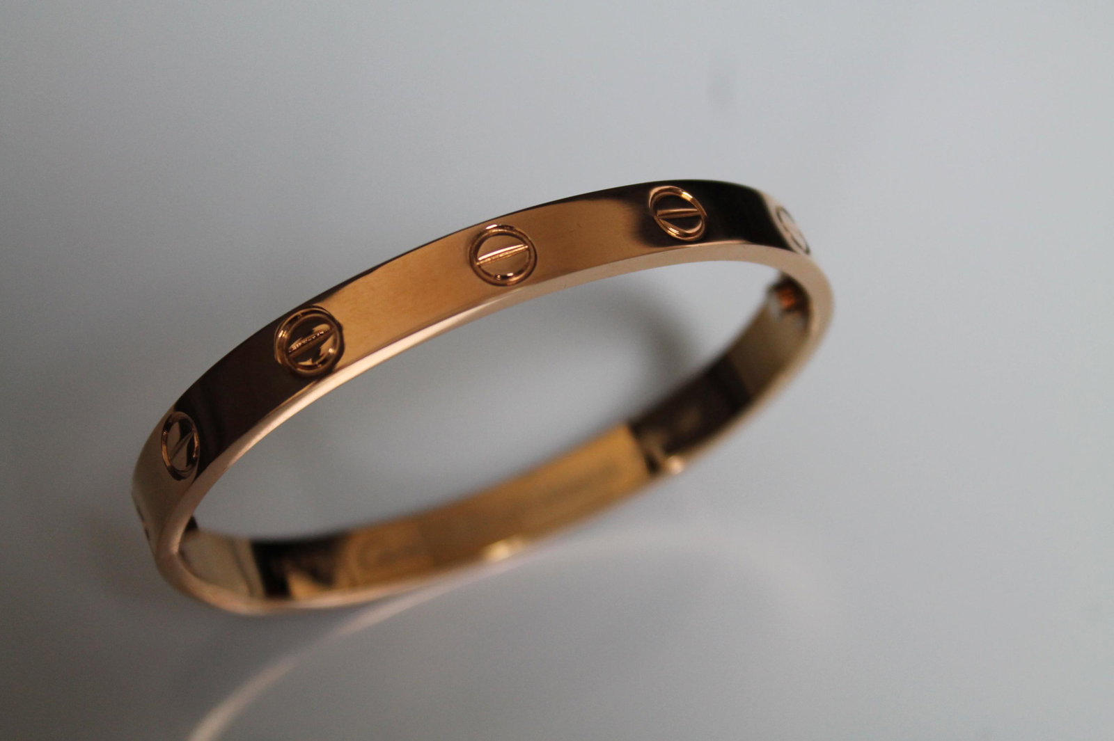 Cartier Love Bracelet Rose Gold: DESCRIPTIONCartier Love collection braceletBracelet size: 18Material: 18k Rose GoldCartier Love bracelet 6.1mm width versionIncludes Cartier bracelet box and screwdriver
