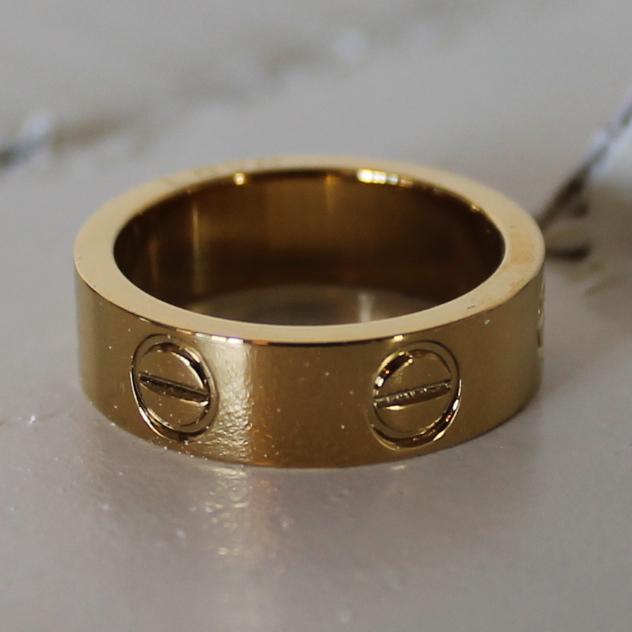 Cartier Love Ring Yellow Gold: DESCRIPTIONCartier Love collection ringRing size: 7Material: 18k Yellow GoldCartier Love ring 6mm width versionIncludes Cartier ring box