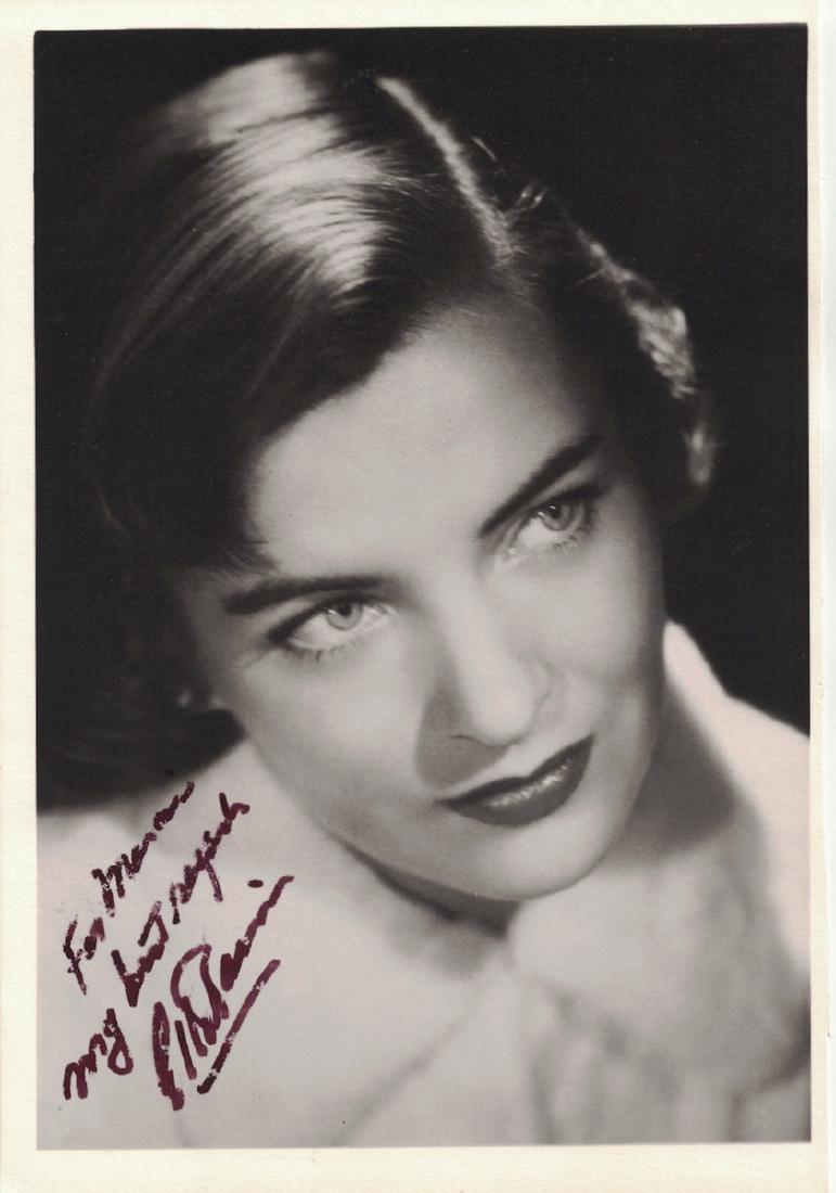 Actress ELLA RAINES - Photo Signed: Ella Raines (1920-1988) Actress. Raines is best remembered for her supporting roles as the love interest in a number of World War II action dramas. 4 ¾” x 7” black and white, matte finish photogr