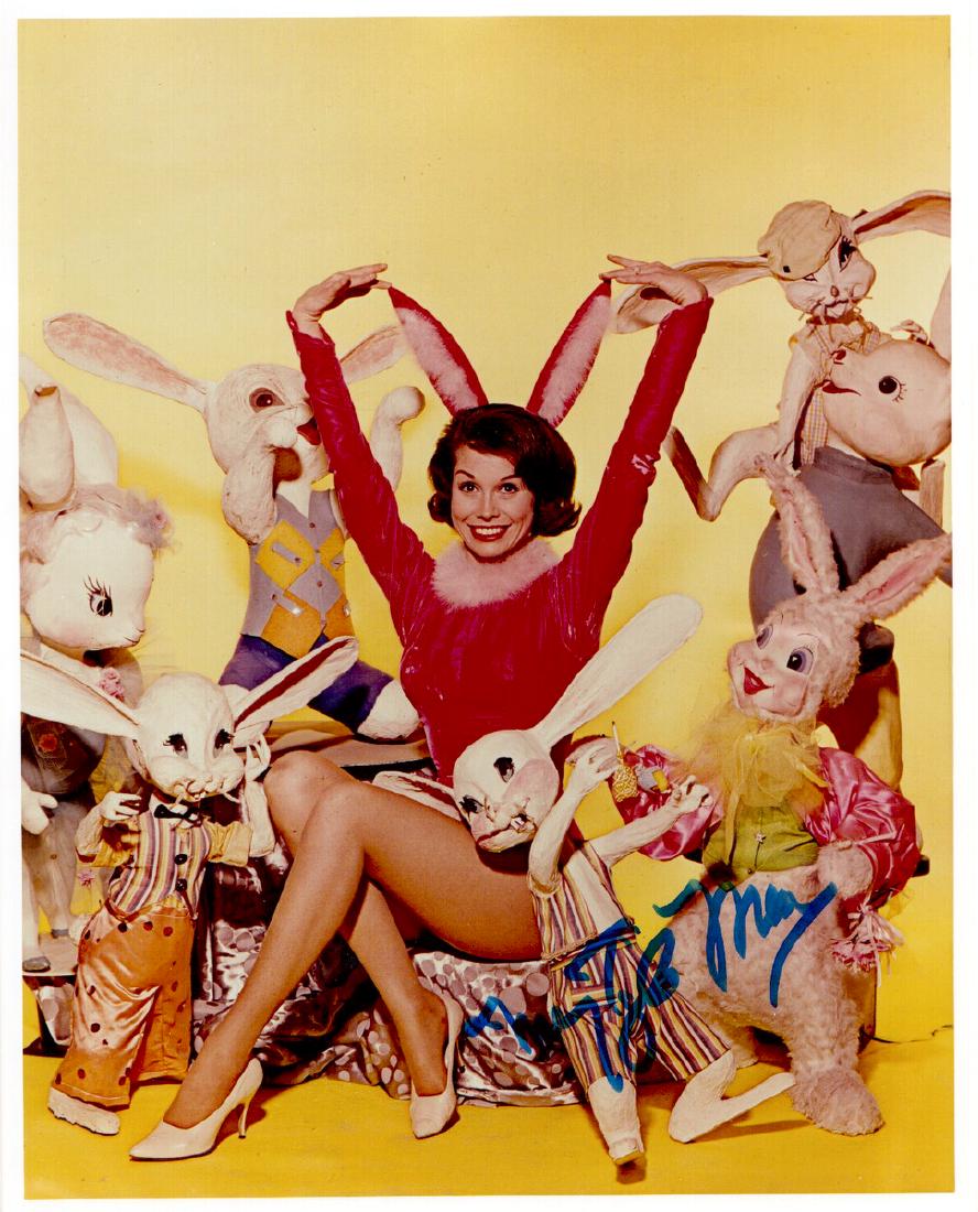 Actress MARY TYLER MOORE - Photo Signed: Mary Tyler Moore (1936-2017) Actress. Moore became one of television's most beloved wives, playing Laura Petrie on The Dick Van Dyke Show, and won two Emmys for her work on the series. The Mary Tyler