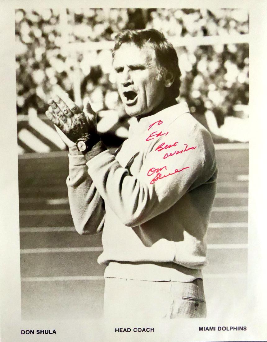 Dolphins Coach DON SHULA - Photo Signed: Don Shula (1930- ) Coach. Shula was the head coach of the NFL's Miami Dolphins from 1970 to 1995, leading the team to two Super Bowl championships and an undefeated season. 8” x 10” black and whit